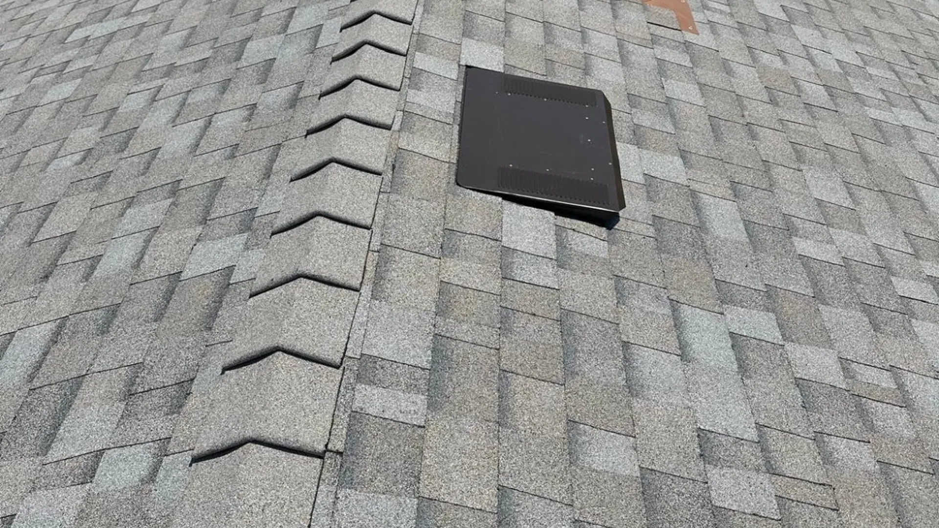 Shingle roof edge and ridge on a Bay Area home