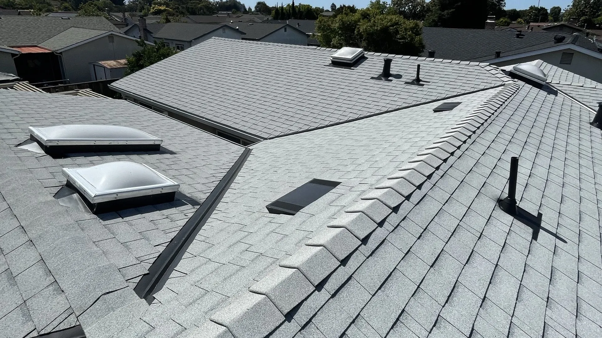 Shingle roof with skylights and vents checked during a roof inspection