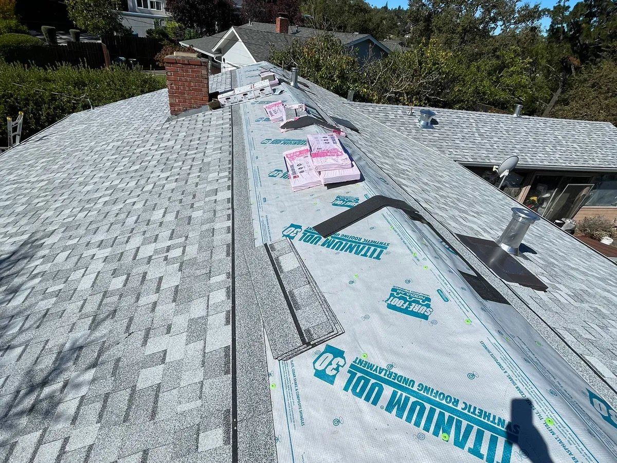 New synthetic underlayment installed during a roof repair