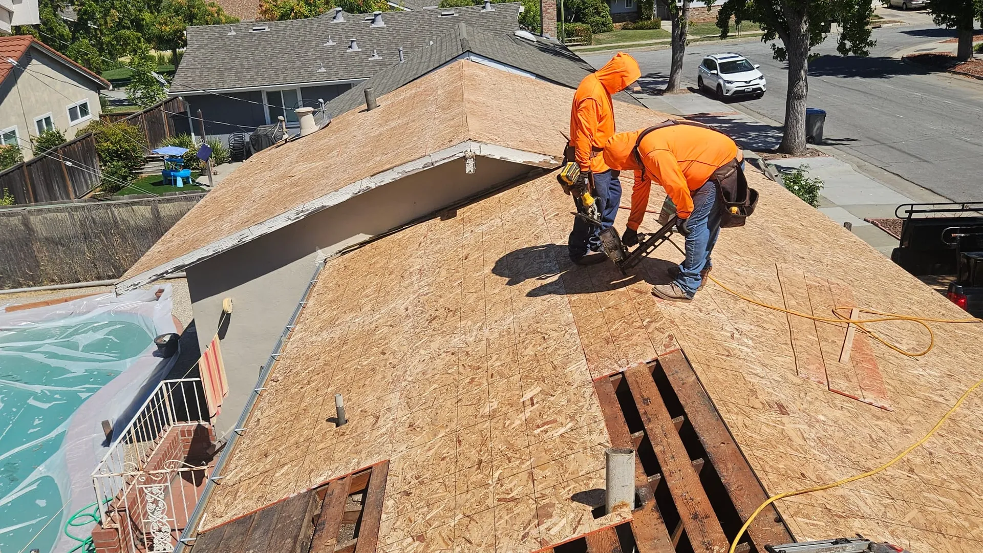 Premier Roofing crew installing new roof decking during a roof replacement in the Bay Area