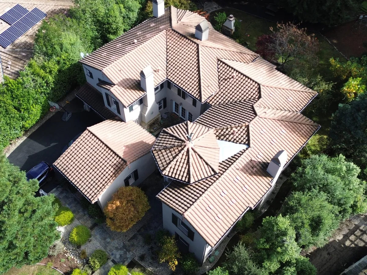 Aerial drone view of a Bay Area home with a clay tile roof
