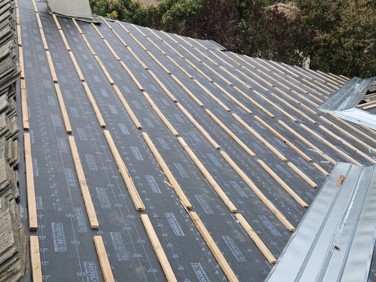 New battens and underlayment installed for a tile roof